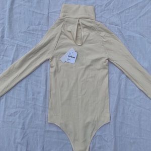 NWT Free People ivory/cream bodysuit